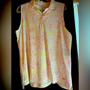 Nike XL dri-fit red, yellow orange geometric pattern golf shirt.